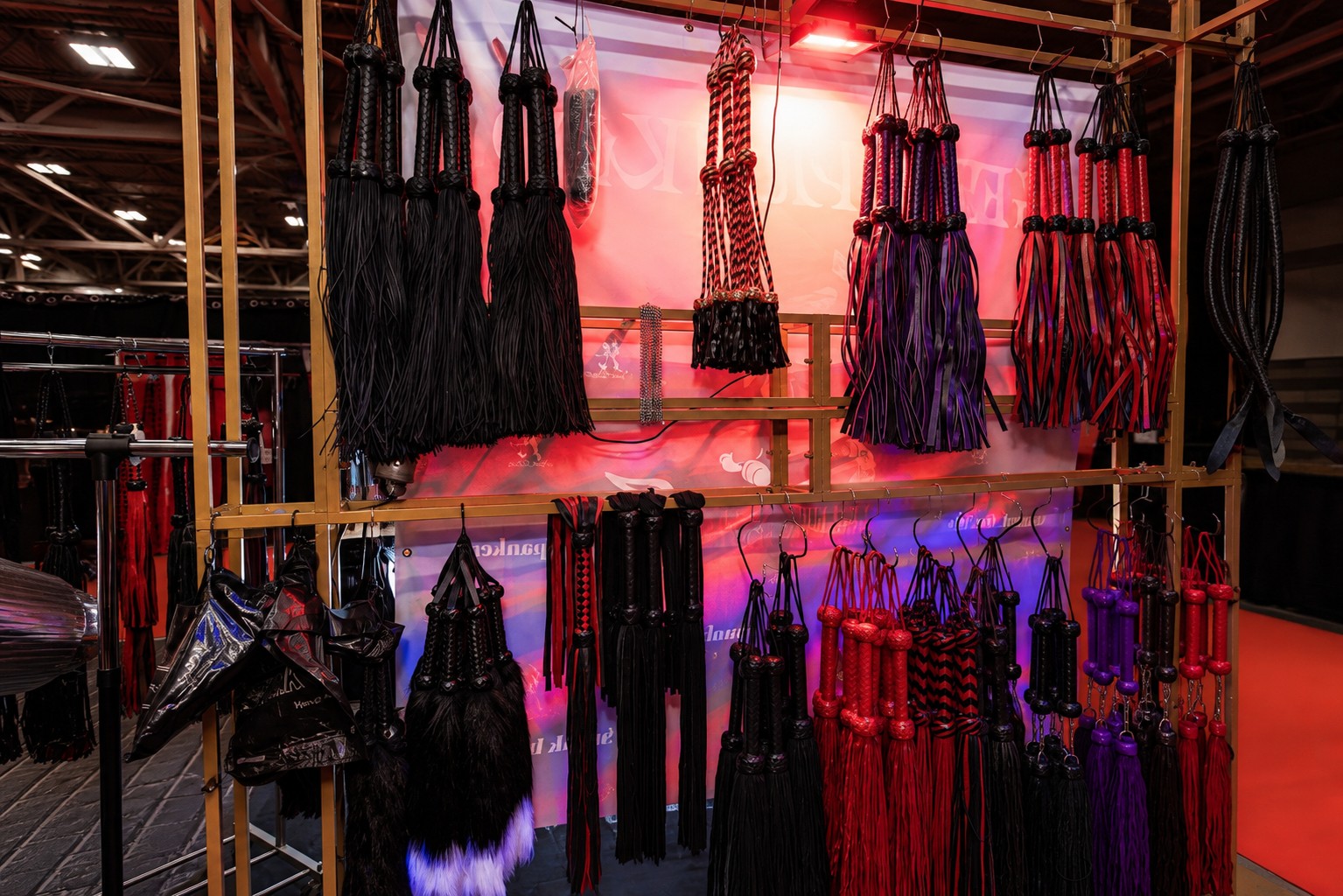 Display of floggers used for Spank Daddy sensual flogging training and education