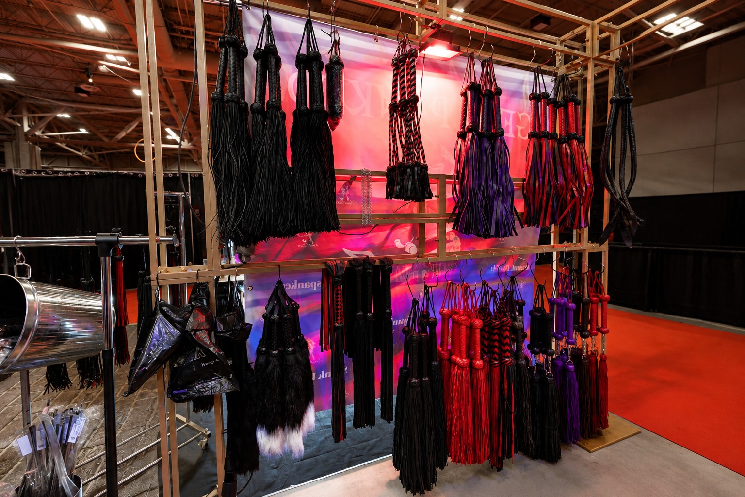 Display of floggers used in Spank Daddy sensual flogging education